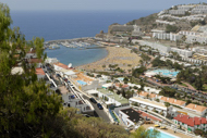 Spain Stock Photography. A view over the roofs, Puerto Rico, Gran Canaria, Spain.